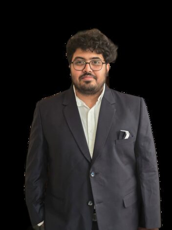 Krishna Palle, three-quarter length, in a dark jacket.